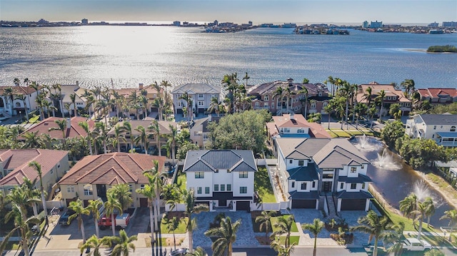 drone / aerial view with a water view