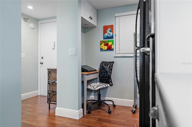 home office featuring hardwood / wood-style floors