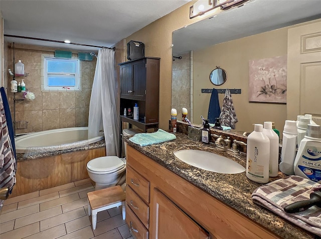 full bathroom featuring shower / tub combo, vanity, toilet, and tile patterned floors