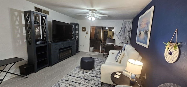 living room featuring ceiling fan