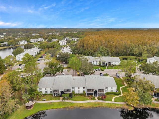 birds eye view of property featuring a residential view and a water view