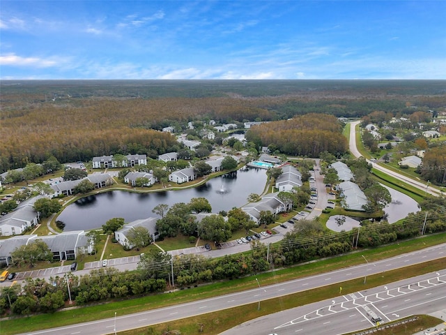 bird's eye view featuring a water view and a residential view