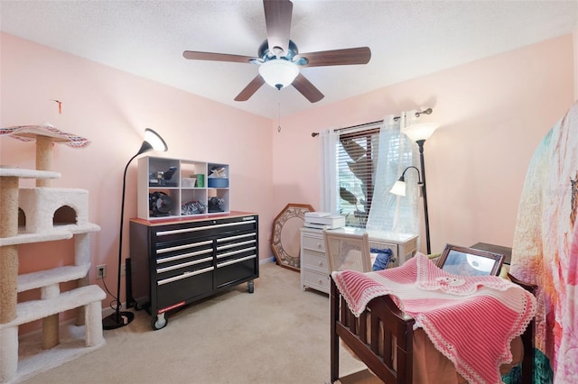 bedroom featuring ceiling fan, carpet flooring, and baseboards