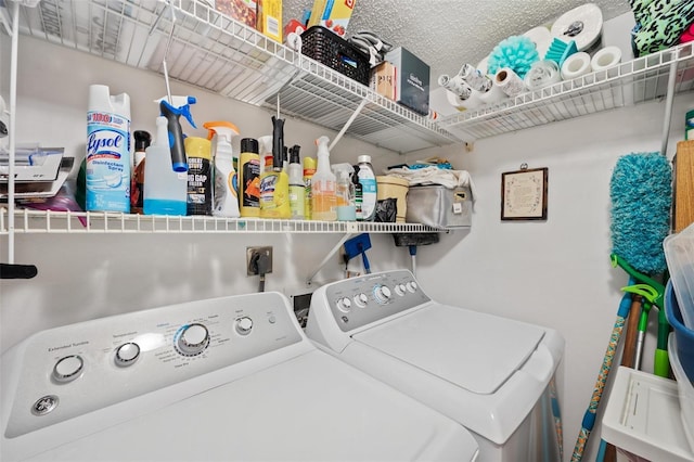 laundry room featuring laundry area and washing machine and clothes dryer