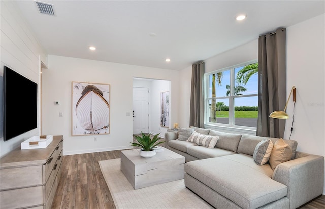 living room with hardwood / wood-style flooring