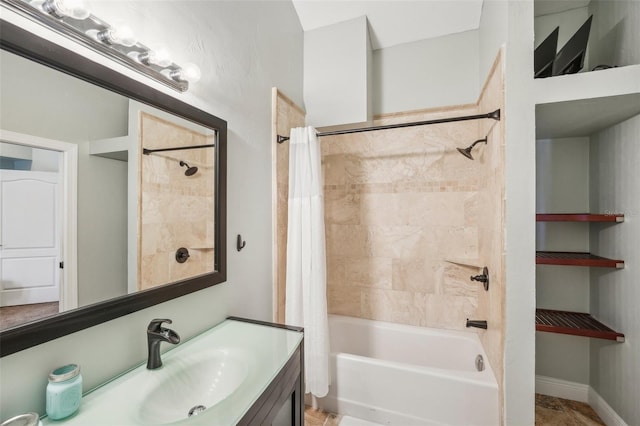 full bathroom featuring shower / bath combo, vanity, and baseboards