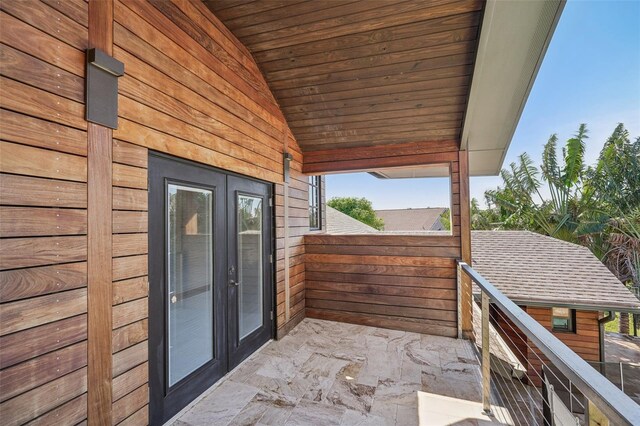 view of patio featuring a balcony