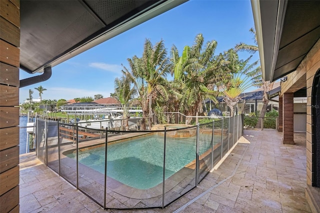 view of swimming pool featuring a patio area and a pool with connected hot tub