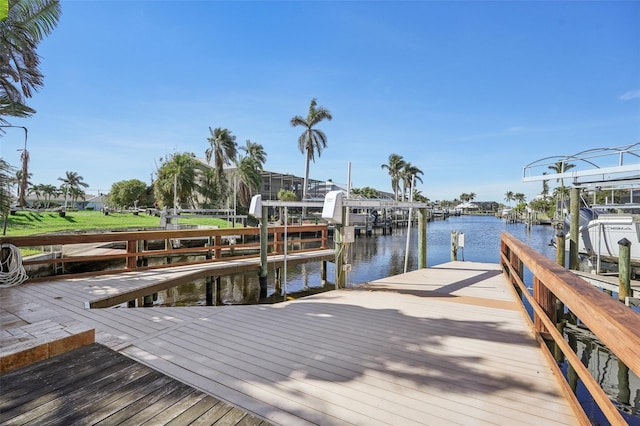 view of dock with a water view and boat lift