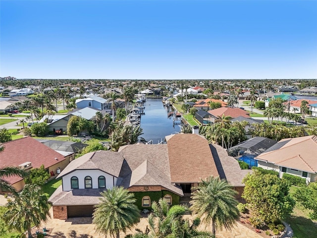 aerial view featuring a water view and a residential view