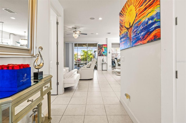 hallway featuring light tile patterned flooring