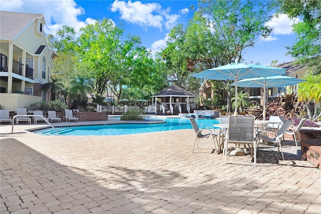 view of pool featuring a patio area and pool water feature