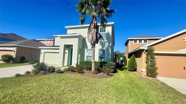 view of front of house with a garage and a front lawn