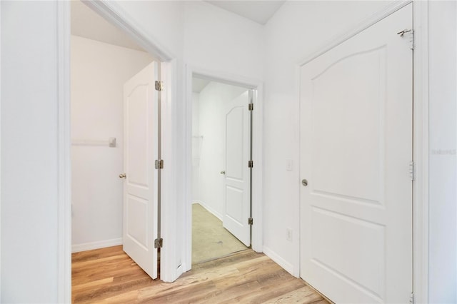 hallway featuring light hardwood / wood-style floors