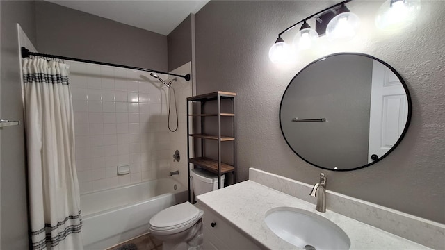 full bathroom featuring shower / bath combo, vanity, and toilet