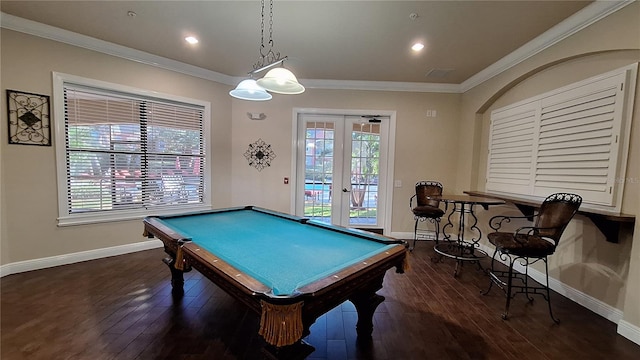 recreation room featuring french doors, dark hardwood / wood-style floors, crown molding, and billiards