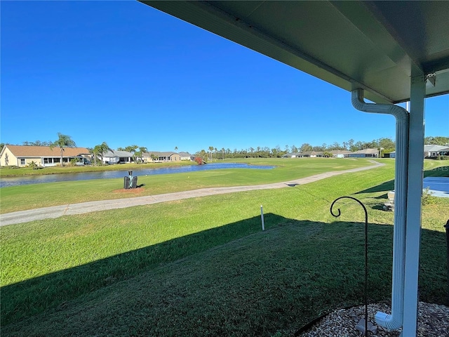 exterior space with a water view