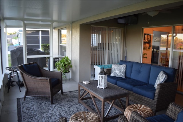 sunroom / solarium featuring plenty of natural light