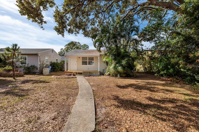 view of front of home with a front yard