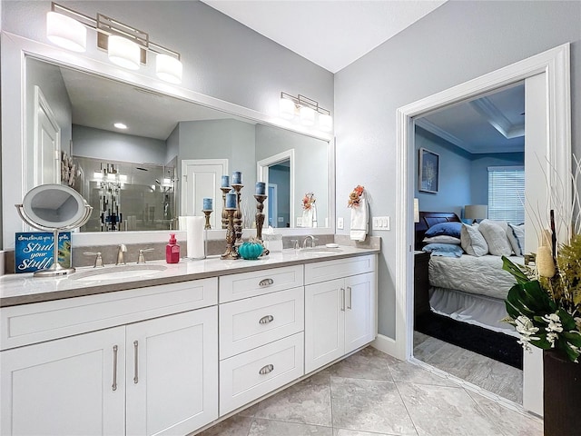 bathroom featuring vanity, tile patterned floors, and walk in shower