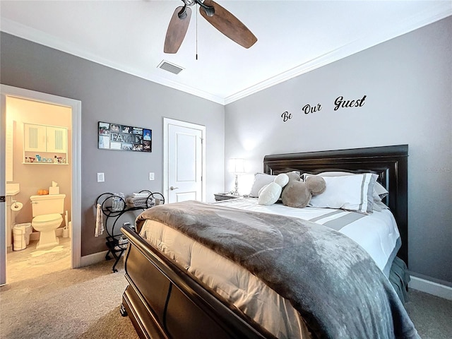 carpeted bedroom featuring ceiling fan, crown molding, and connected bathroom