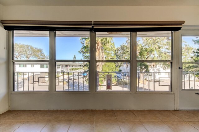 1221 Drew St Unit E11, Clearwater, FL 33755 - tiled spare room with healthy amount of natural light