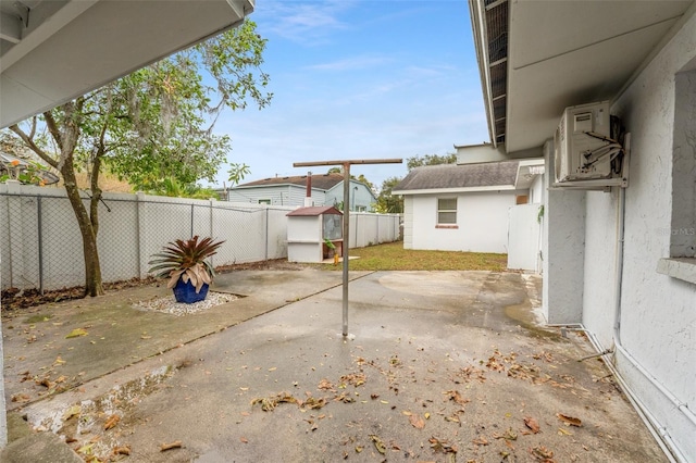 view of patio / terrace with a storage unit