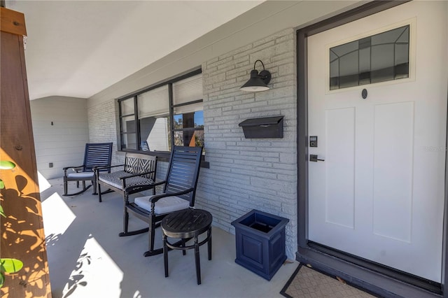 doorway to property with covered porch