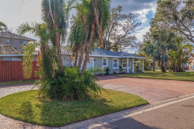 view of front facade with a front yard