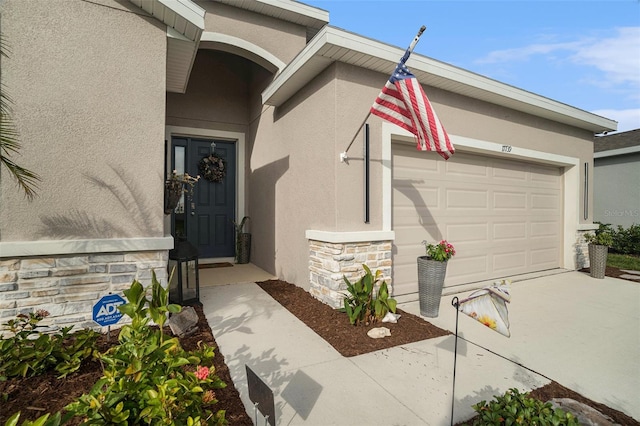 property entrance with a garage