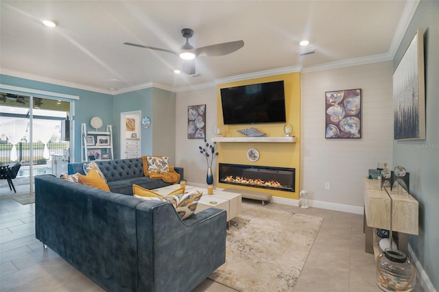 living room with light tile patterned floors, ceiling fan, and ornamental molding