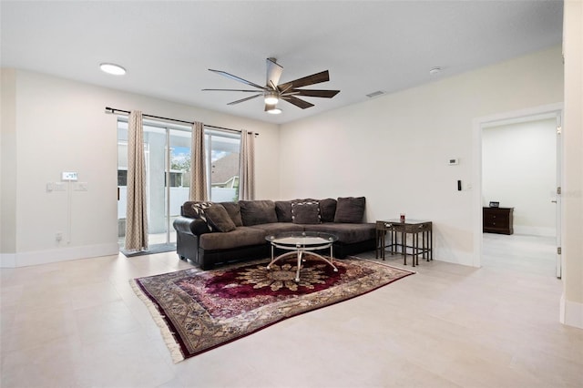 living room featuring ceiling fan