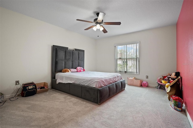 bedroom with light carpet and ceiling fan