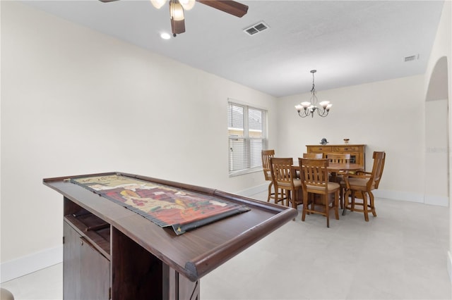 dining space featuring visible vents, baseboards, and ceiling fan with notable chandelier