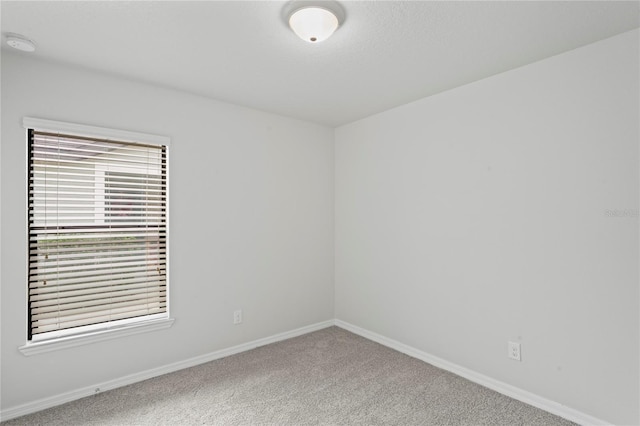 empty room with carpet floors