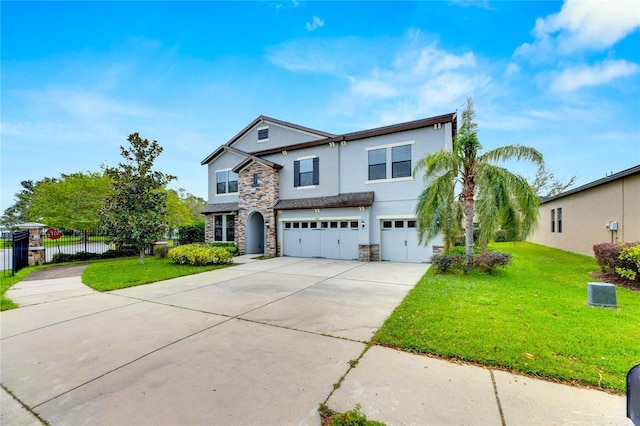 view of front of home featuring a front lawn and a garage