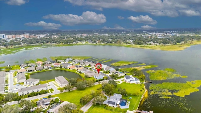 drone / aerial view with a water view