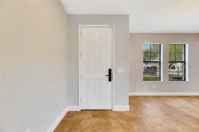 view of tiled foyer entrance