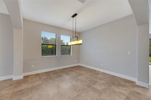 view of tiled spare room