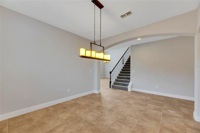 spare room with light tile patterned floors