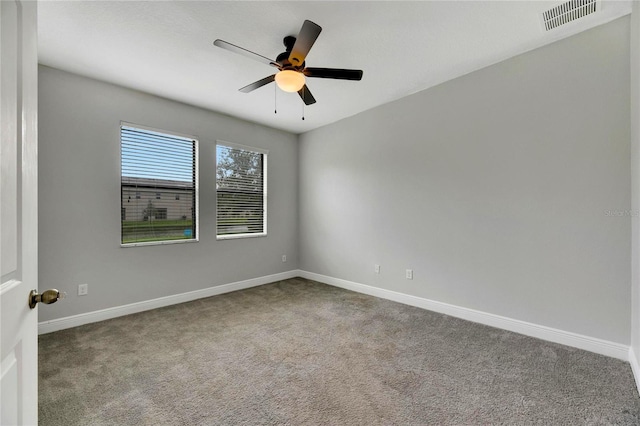 unfurnished room featuring carpet flooring and ceiling fan