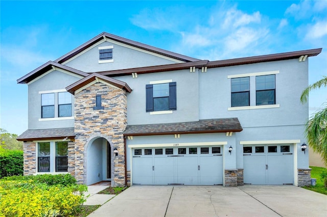 view of front of home with a garage