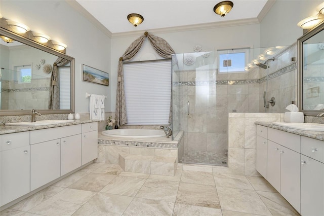 bathroom featuring vanity, separate shower and tub, and ornamental molding