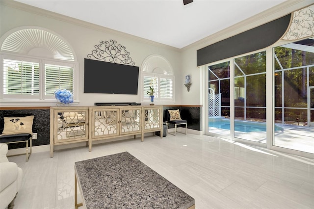 living room with ornamental molding