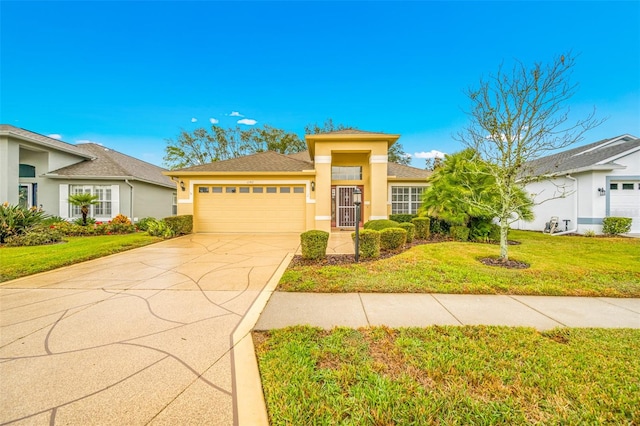 view of front of home featuring a garage and a front yard