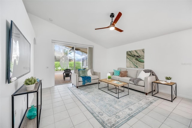 tiled living room featuring ceiling fan and vaulted ceiling