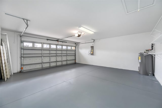 garage featuring a garage door opener, electric panel, and water heater