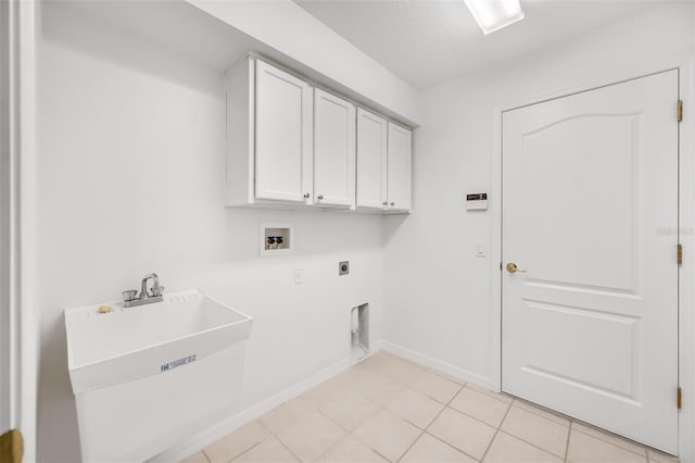 laundry room featuring cabinets, electric dryer hookup, sink, and washer hookup