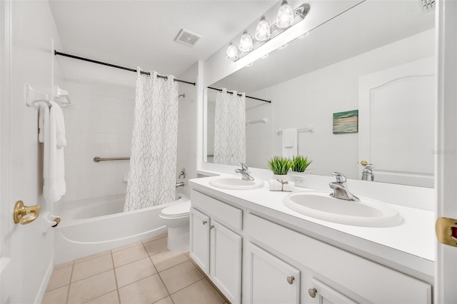 full bathroom with tile patterned flooring, vanity, shower / bath combination with curtain, and toilet