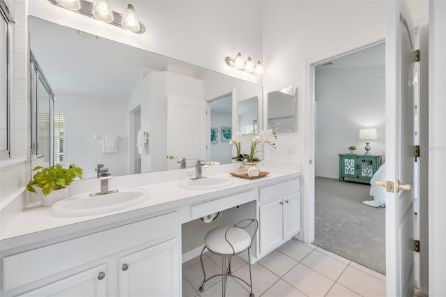 bathroom featuring vanity and tile patterned flooring